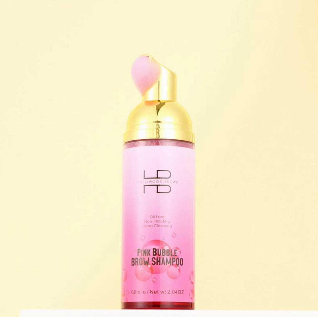 Ein rosa & blauer Bubble Brow Shampoo Schaum von Hollywood Brows, ideal für ölfreie Formel und Augenbrauen Reinigung. Blashy Shop