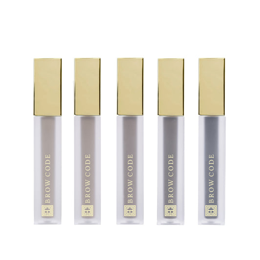 Fünf Brow Code Getöntes Multipeptid-Augenbrauengel-Tuben mit Goldkappen präsentieren hochwertige Augenbrauenpflege. Blashy Shop