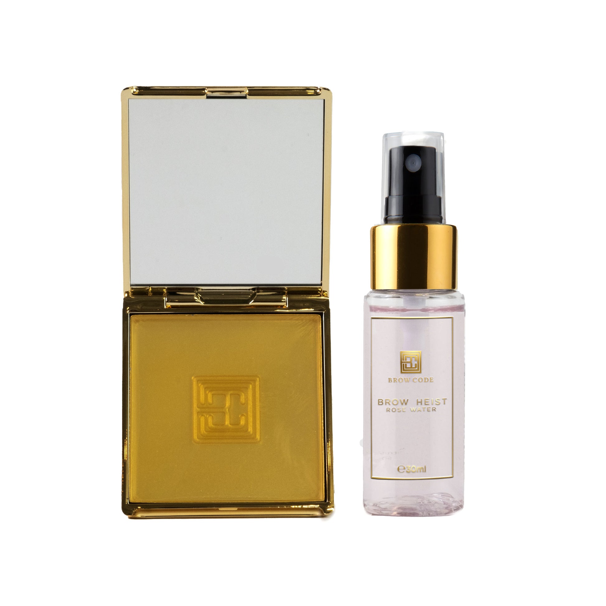 Eine goldene Puderdose mit Spiegel neben Brow Code Rosenwasser Spray, 30ml, Brow Heist für gepflegte Brauen. Blashy Shop